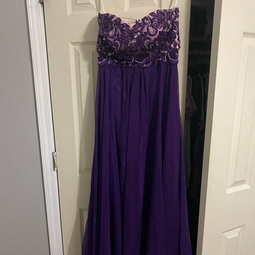 My 2015 prom dress. It’s been altered. Kasey J.